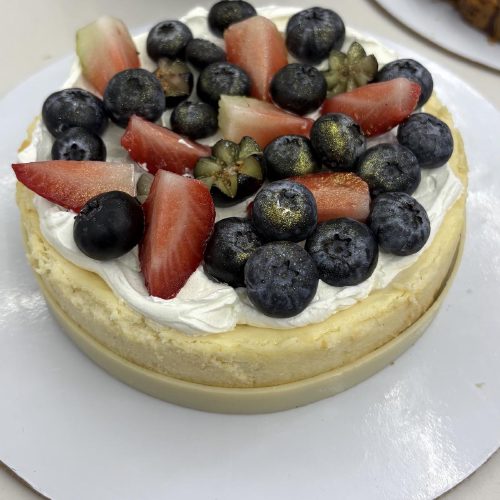 Berry cheesecake with blueberries and strawberries Crème It Up Chandigarh